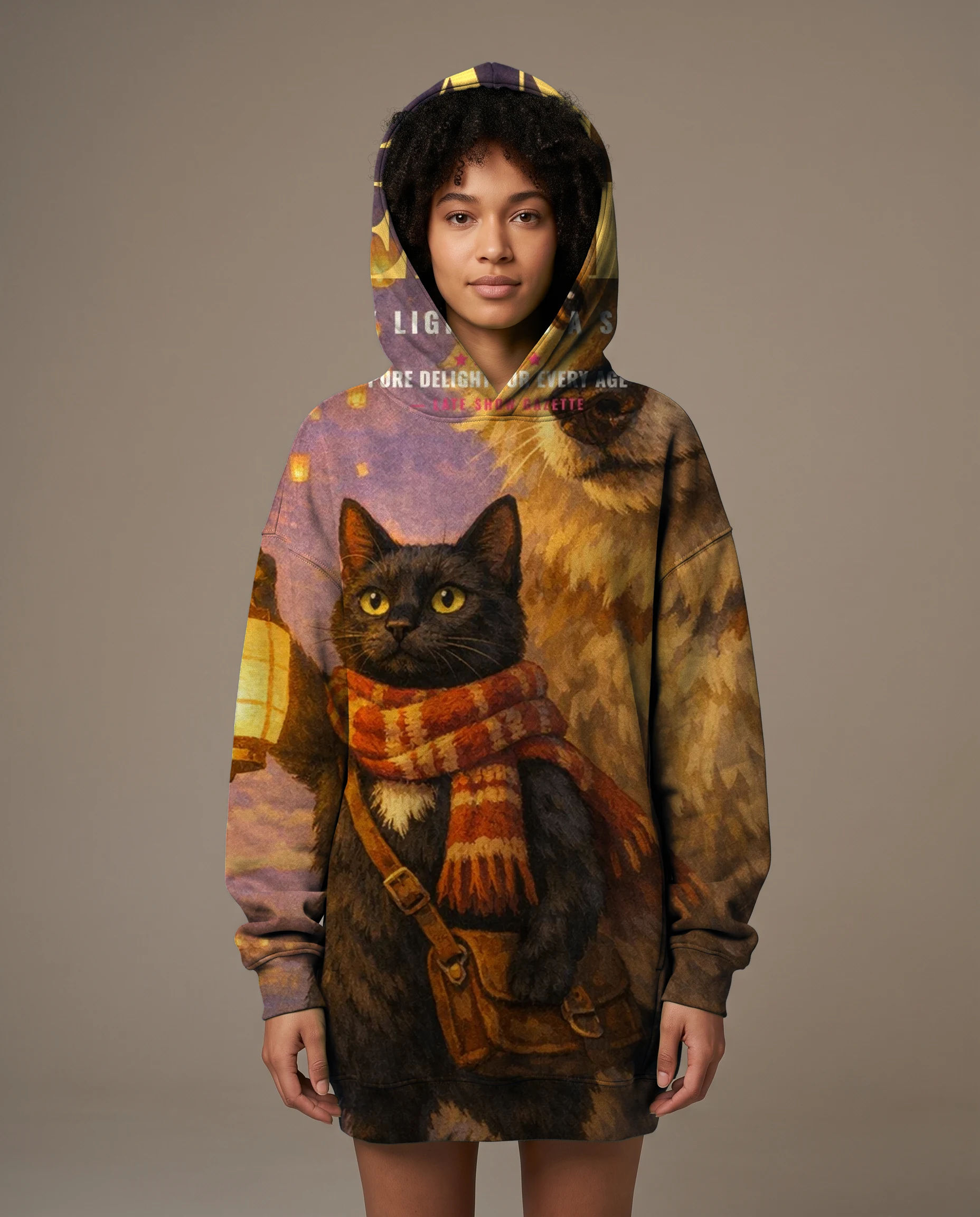 A hoodie printed edge to edge with the Storybook Family poster of Nadia the cat